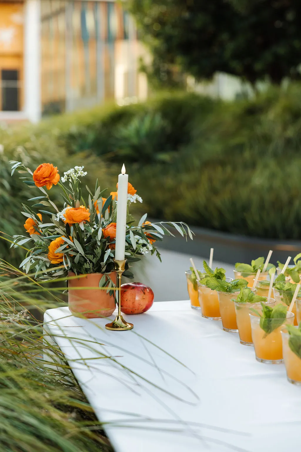 Welcome drinks set out on a garden table