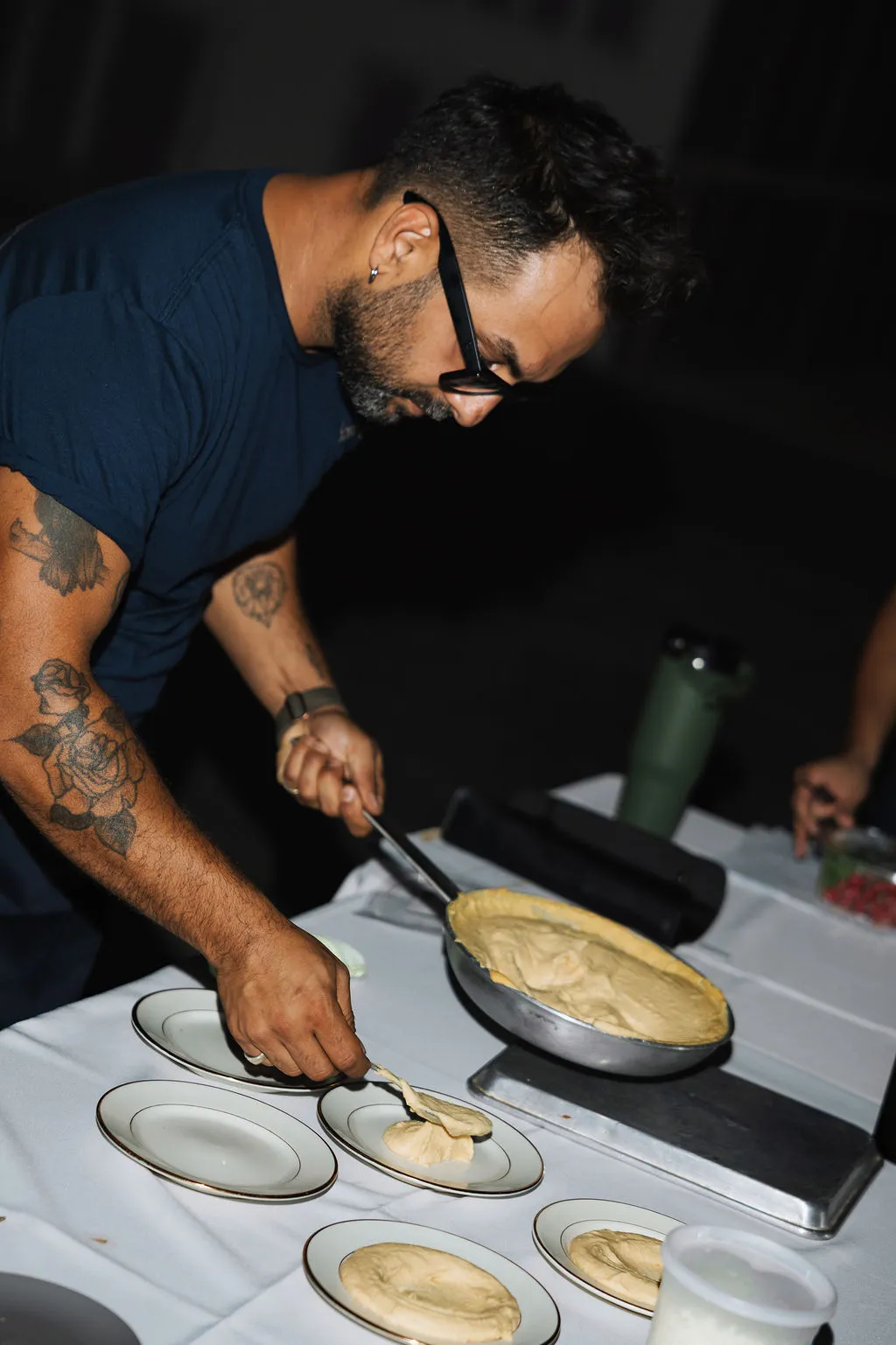 Chef Seckin plating a dish